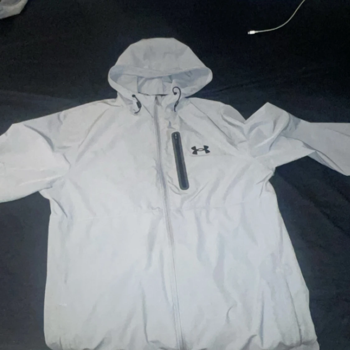 Grå vindjacka från Under Armour