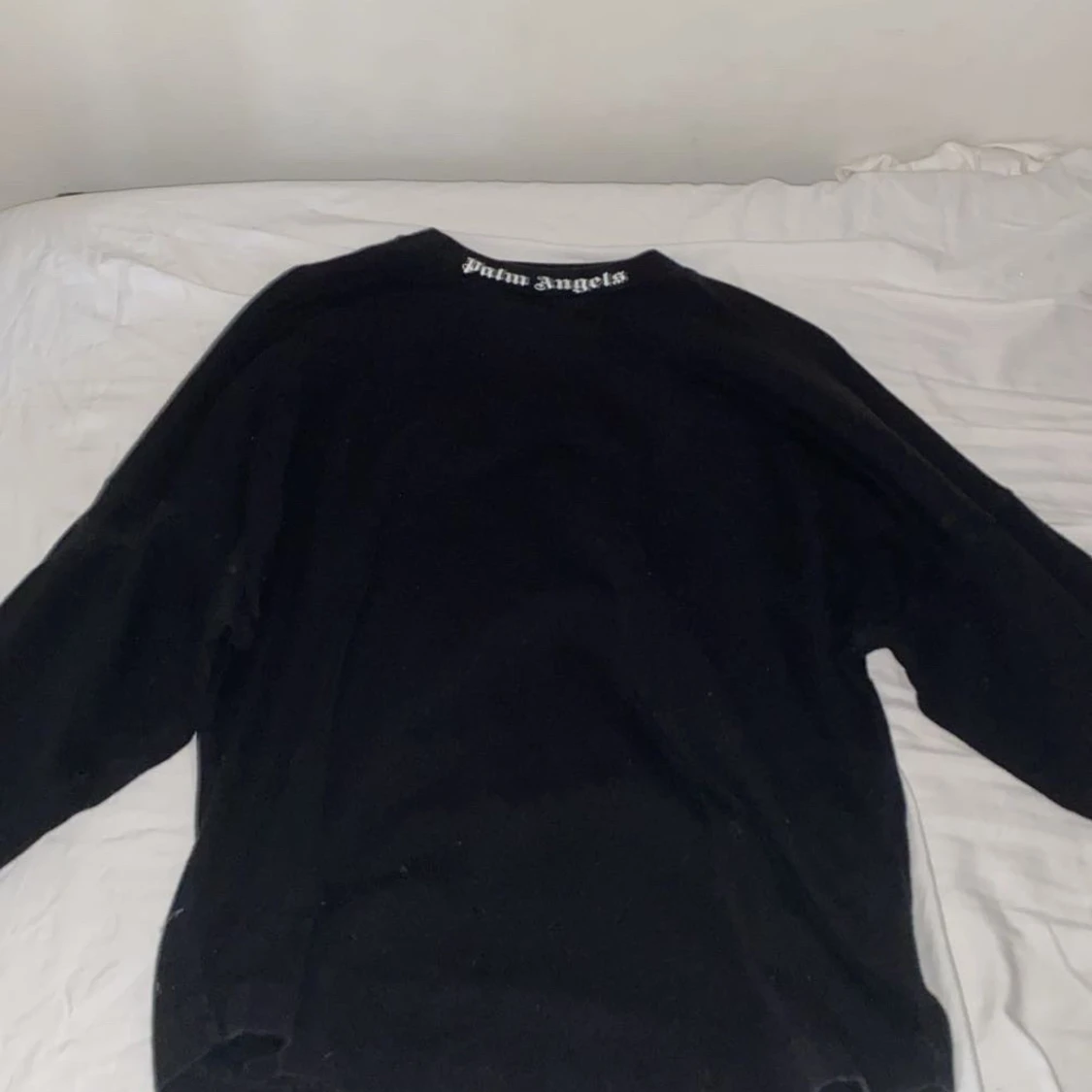 Svart t-shirt och tröja från Palm Angels - 1