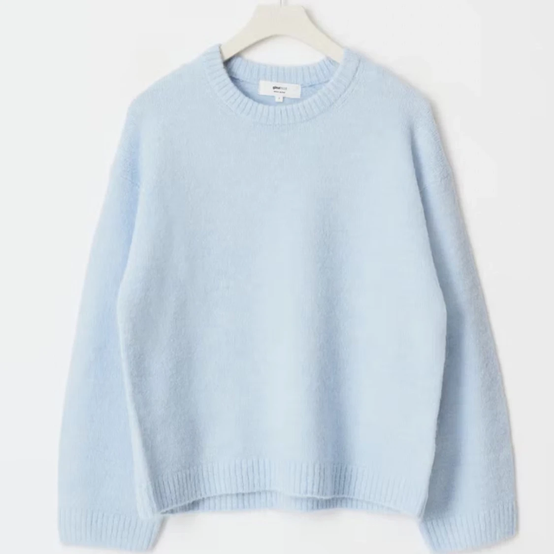 Ljusblå stickad tröja