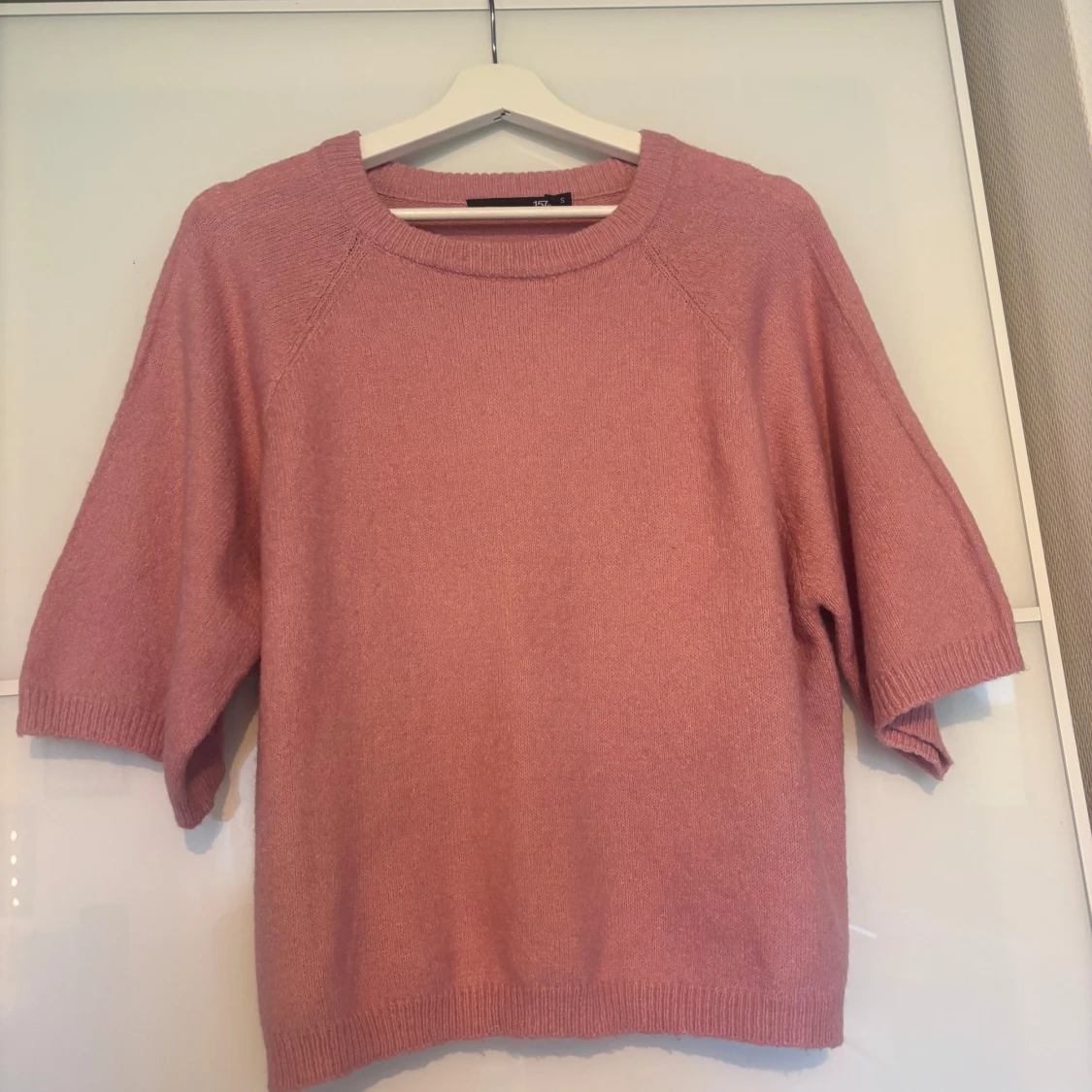 Rosa stickad tröja från 157, S