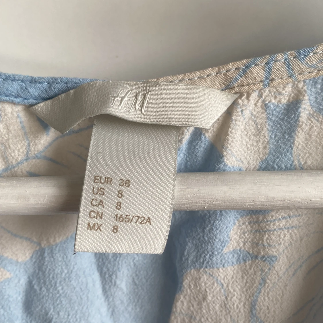 Blåvit blommig byxdress - 2