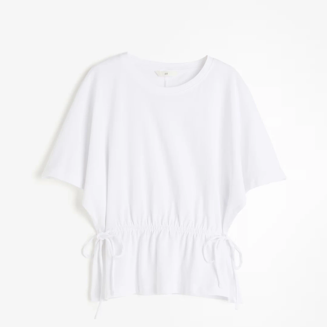 Vit topp med knyt i midjan H&M