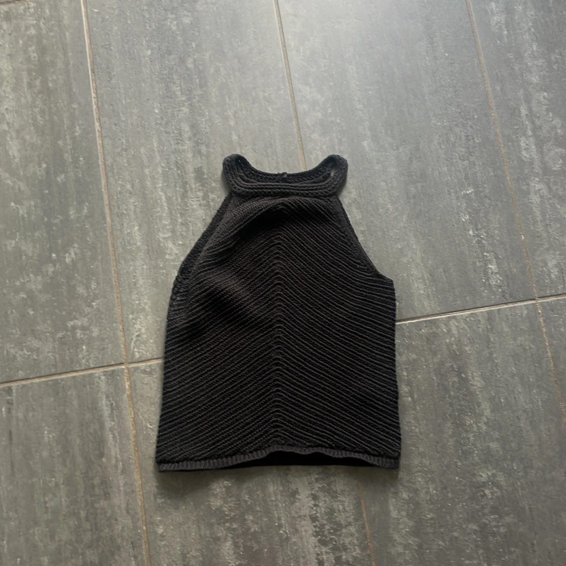 Svart stickad linnetopp från Lindex