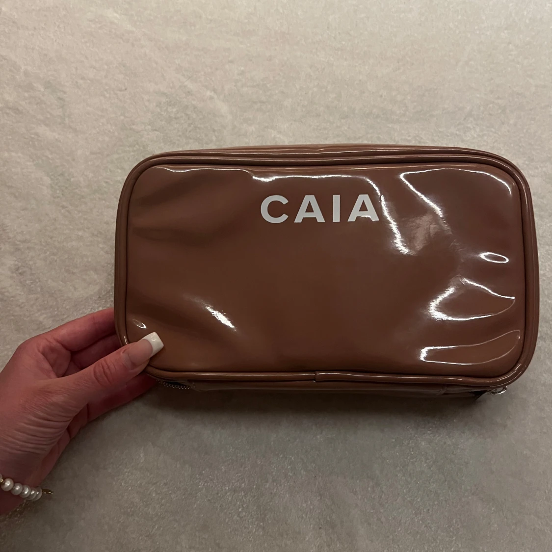 Brun necessär från CAIA