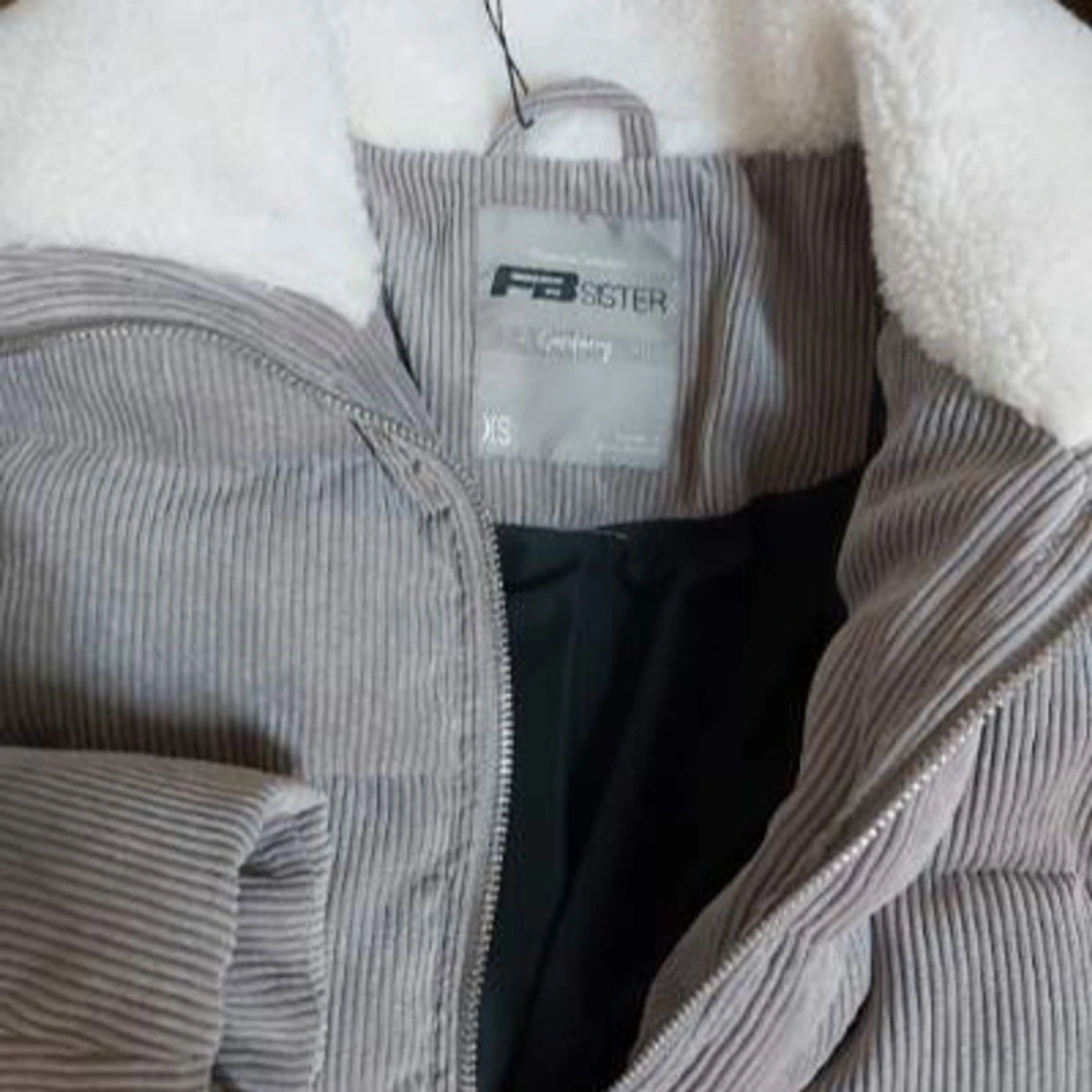 Grå pufferjacka med teddyfoder - 91