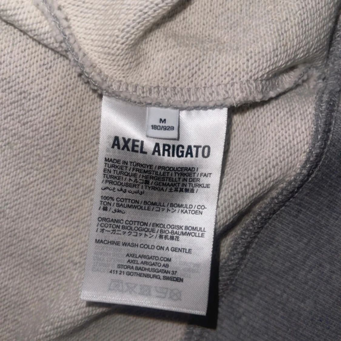 Grå hoodie från Axel Arigato - 2