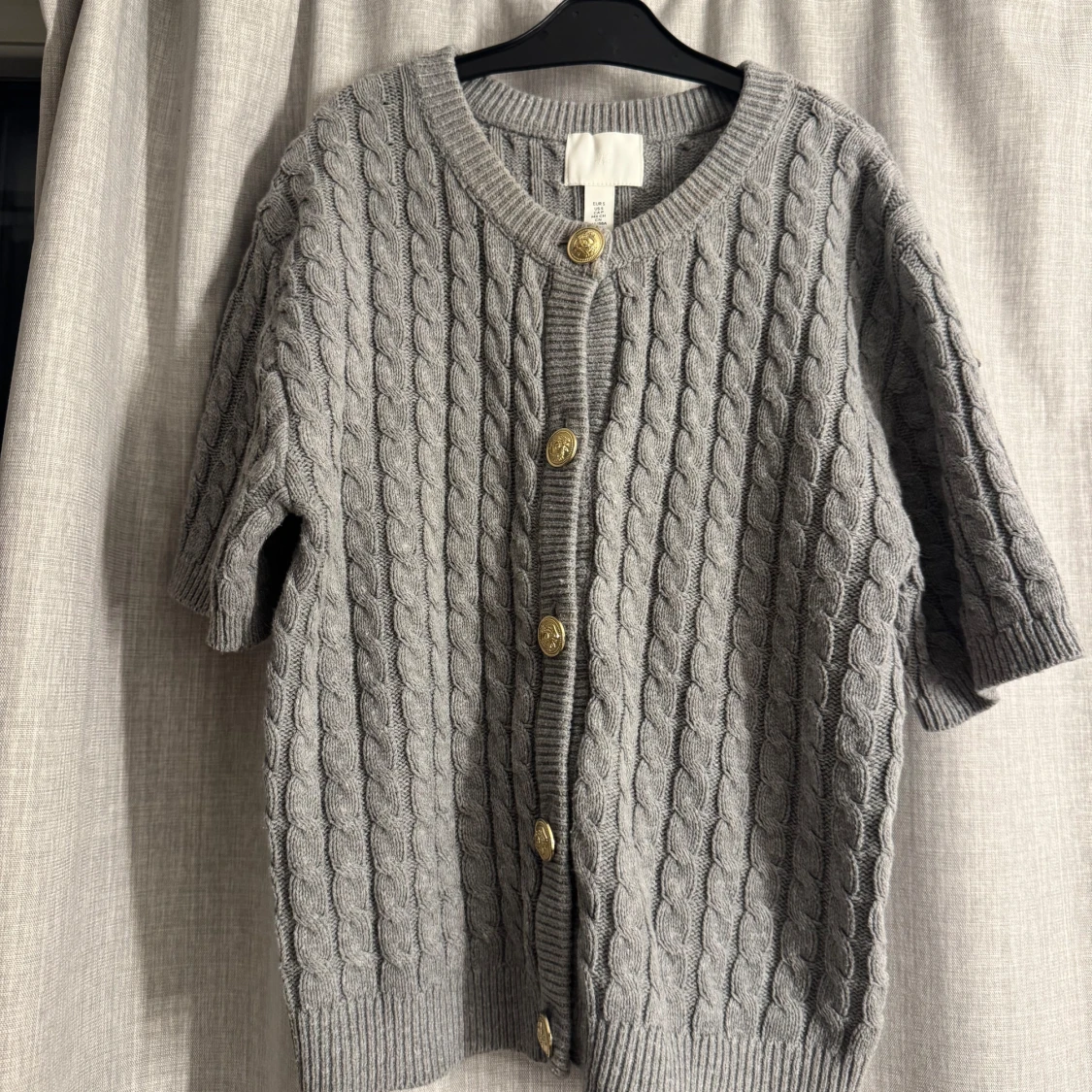 Grå stickad kofta från H&M