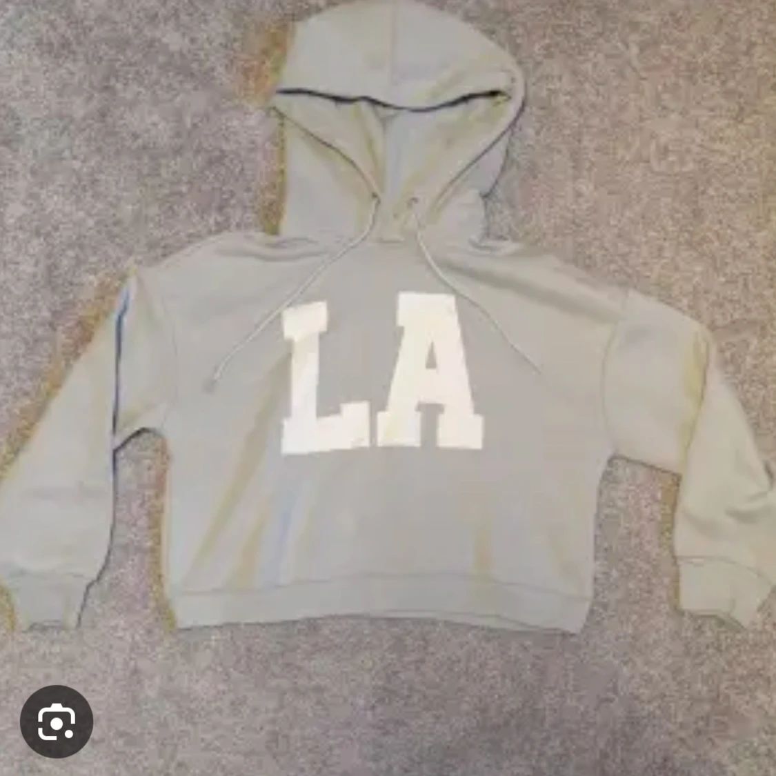 Grå hoodie med LA-tryck