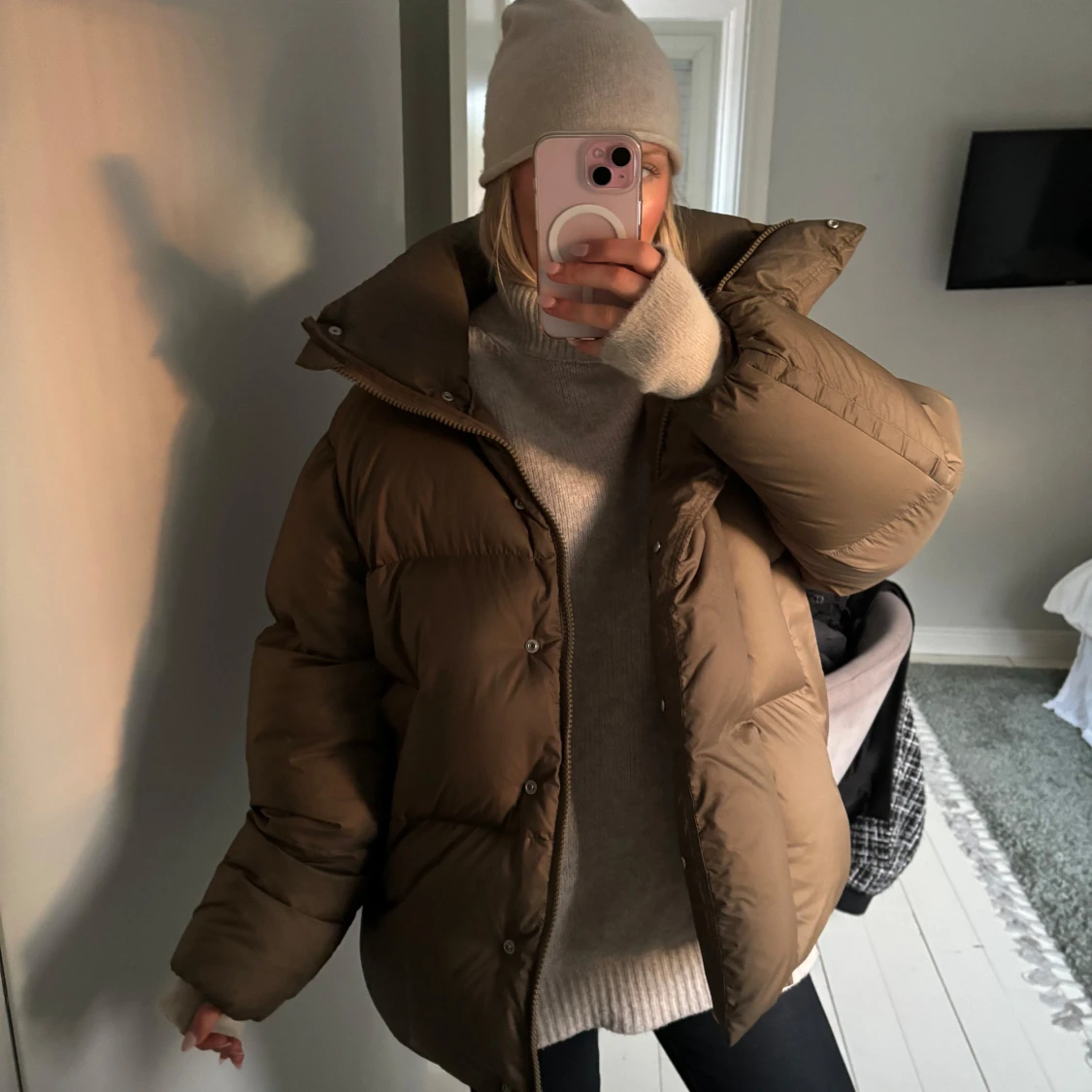 Brun dunjacka i storlek XS