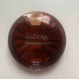 Helt ny och oöppnad bronzer från osadora i golden tan