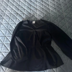 Blus - Använd en gång 