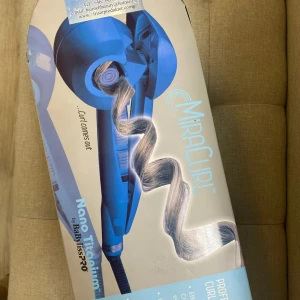 Locktång  - Locktång/curlmachine oanvänd fick i present. 