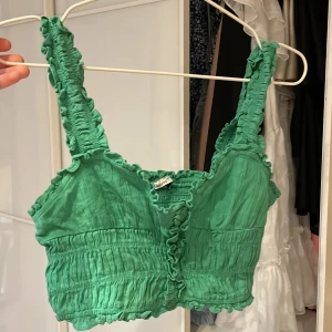 Topp - Fin grön topp. 