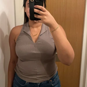 Snygg topp - Snygg topp i bra skick, använd endast en gång.