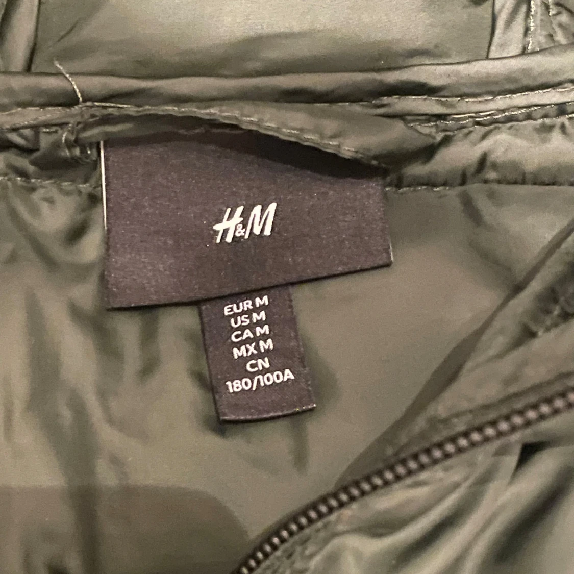 Grön pufferjacka från H&M - 1