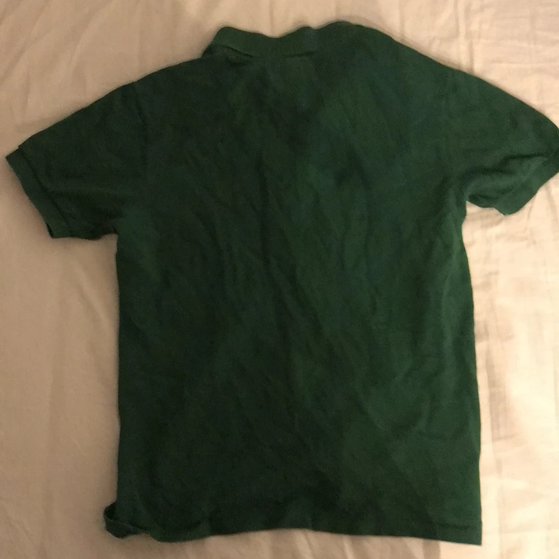 Grön pikétröja från Lacoste - 90