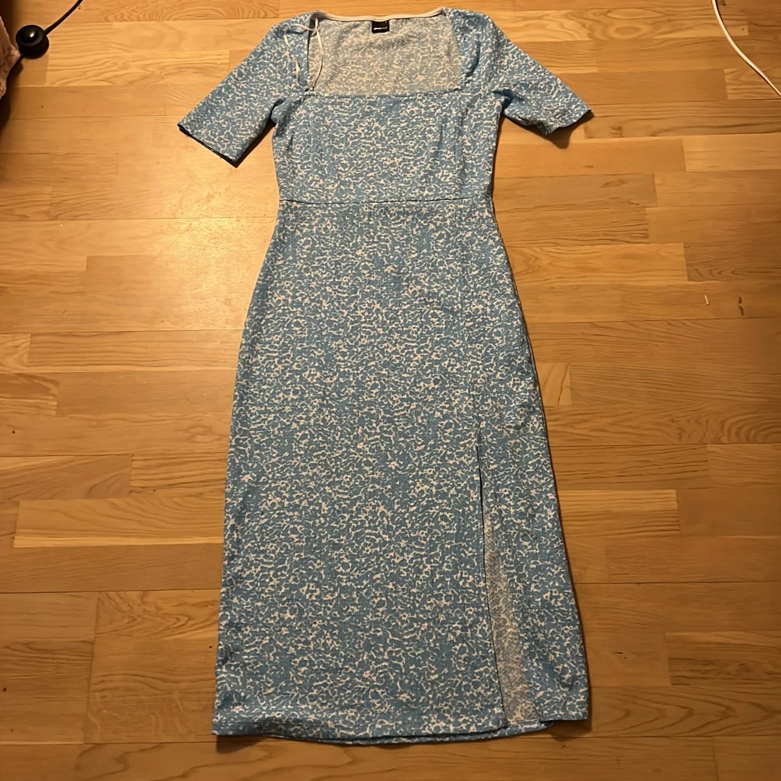 Blå klänning från Gina Tricot