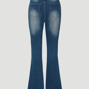 Flare jeans - Flare/bootcut jeans. Mörkblåa trendiga jeans. Storlek 152-158cm. Använder aldrig