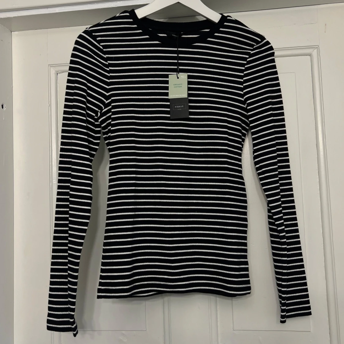 Svartvit randig tröja