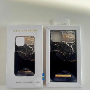 Ideal of sweden skal till iPhone 13 - Ideal of sweden skal till iPhone 13( fungerar säkert till andra moneller också) helt oanvänd endast öppnad. Säljer eftersom jag inte använder den. Rök och djurfritt hem.