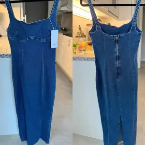 Oanvänd Jeansklänning från bershka. Storlek M. Nypris 499kr