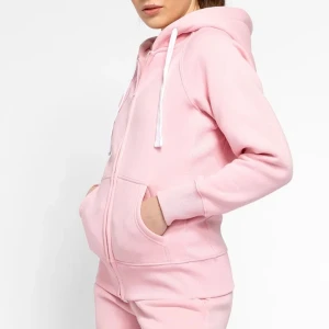 Rosa hoodie med dragkedja - Säljer en mysig rosa hoodie med dragkedja och fickor framtill. Från russemerch i nyskick, storlek xxs