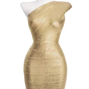 Bella Barnett klänning - Bella Barnett guld bandage klänning, använd en gång.