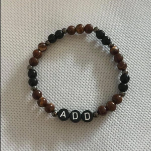 Armband  - Armband med text  Frakt tillkommer 