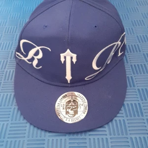 Trapstar keps - Använd en sommar. Se defekt på bild 2