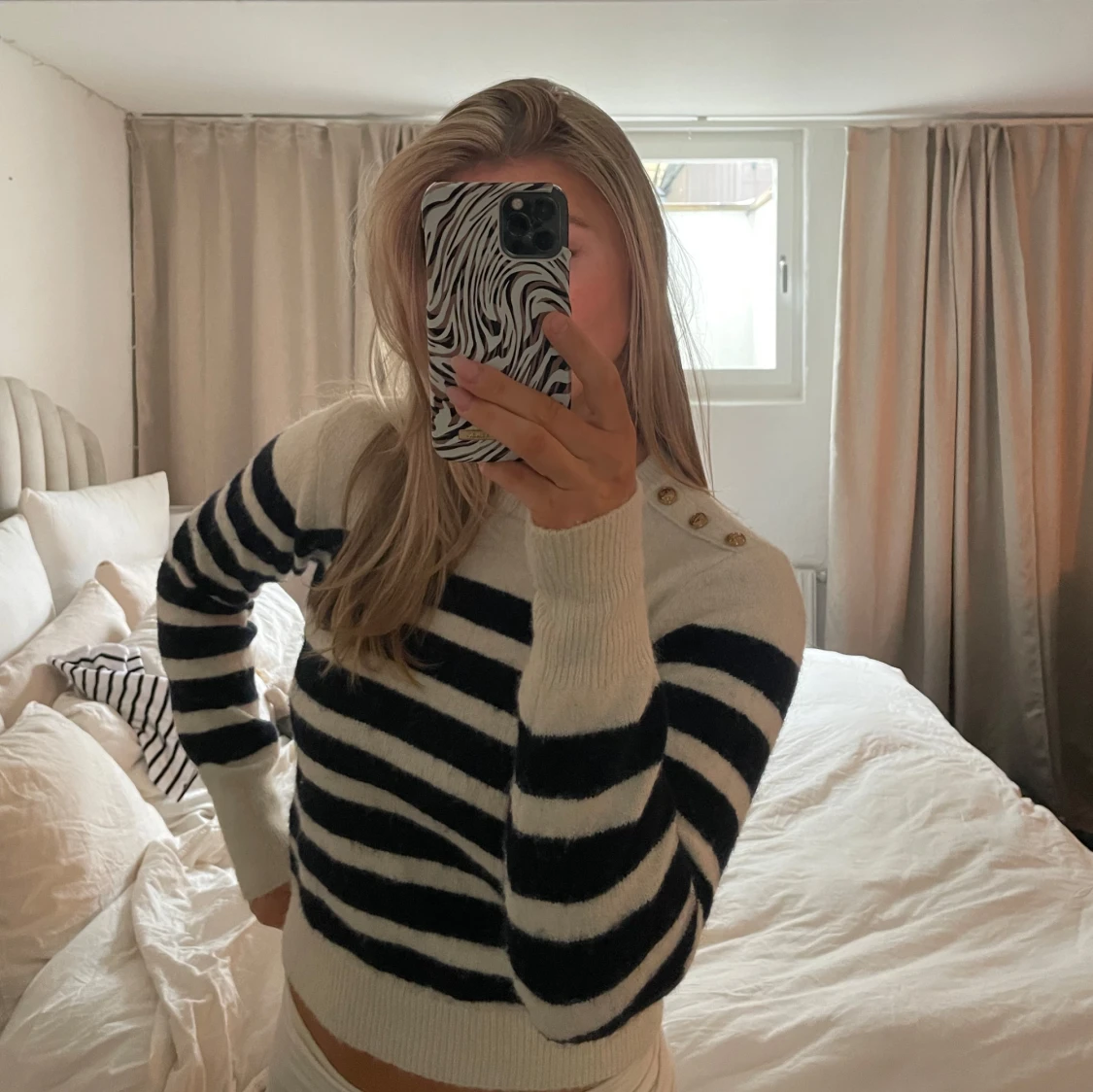 Randig stickad tröja