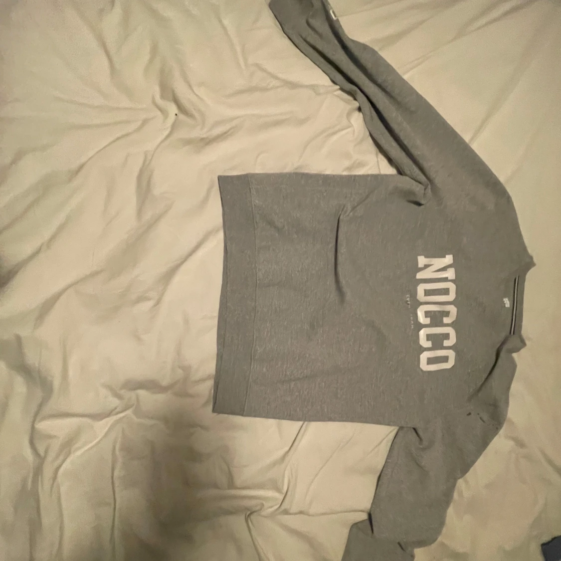 Grå tröja från NOCCO