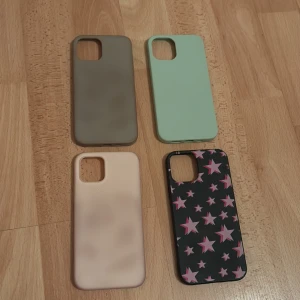 Fyra mobilskal i olika färger och mönster - Säljer fyra olika mobilskal. Ett i beige, ett i mintgrön, ett i svart med rosa stjärnor och ett i grått. Perfekt för att byta stil på din mobil beroende på humör eller outfit. Alla är från hm förutom det med stjärnor som är från Shein!