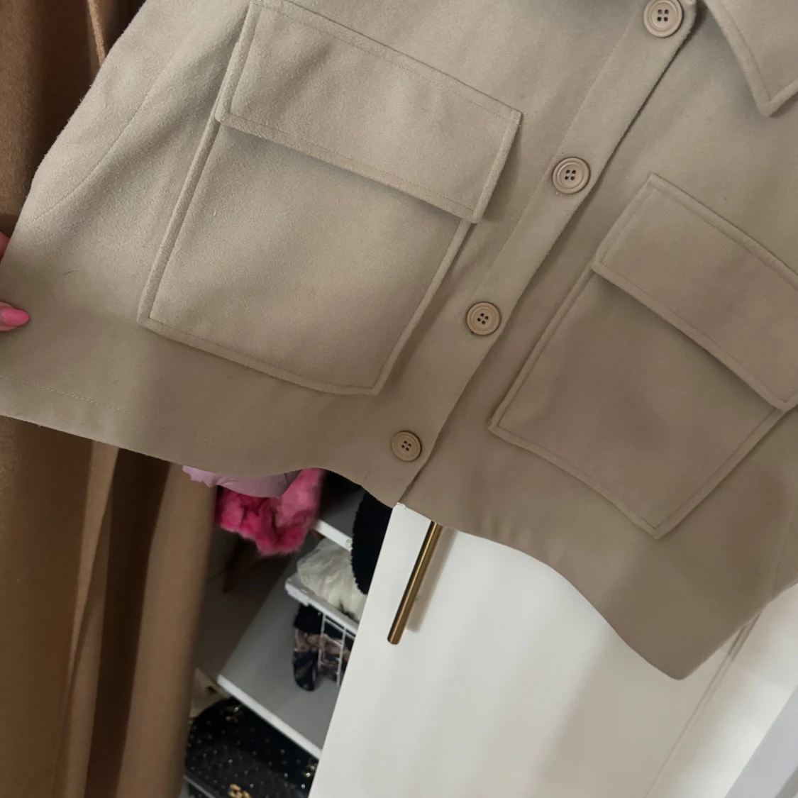 Beige väst med knappar - 1