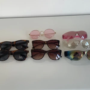 Sunshades - 8 pairs (Vans) - 2x VANS - brown pattern 2x Leopard print shades  3x Rimless sport shades 1x pink round shades