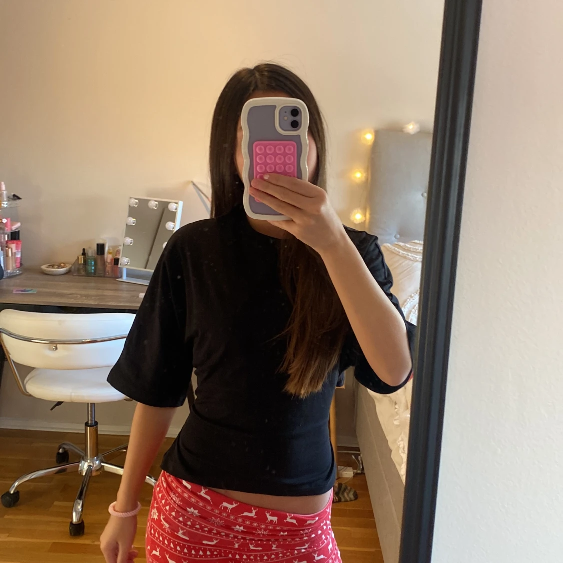 Svart topp med knyt från Nelly