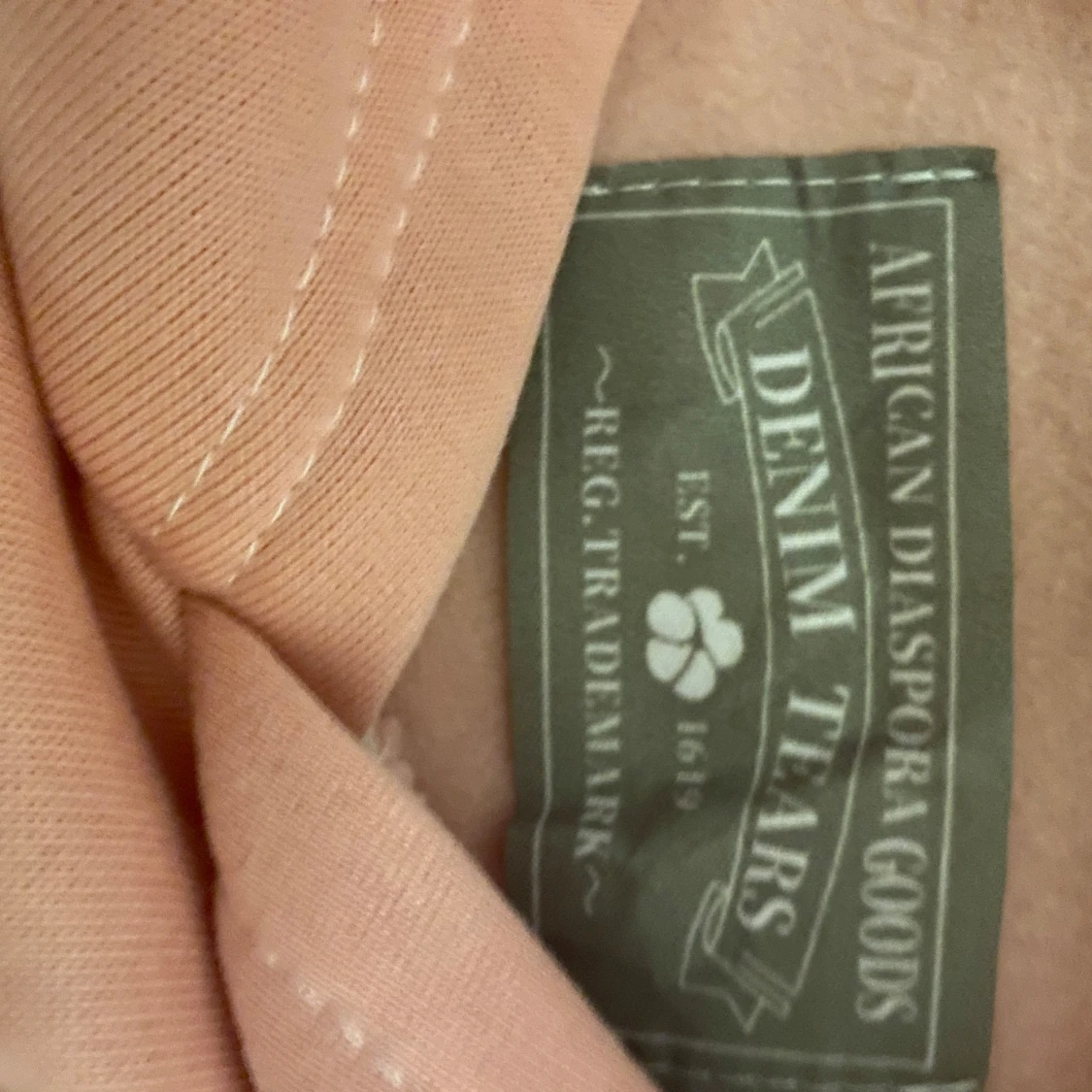 Rosa hoodie från Denim Tears - 90