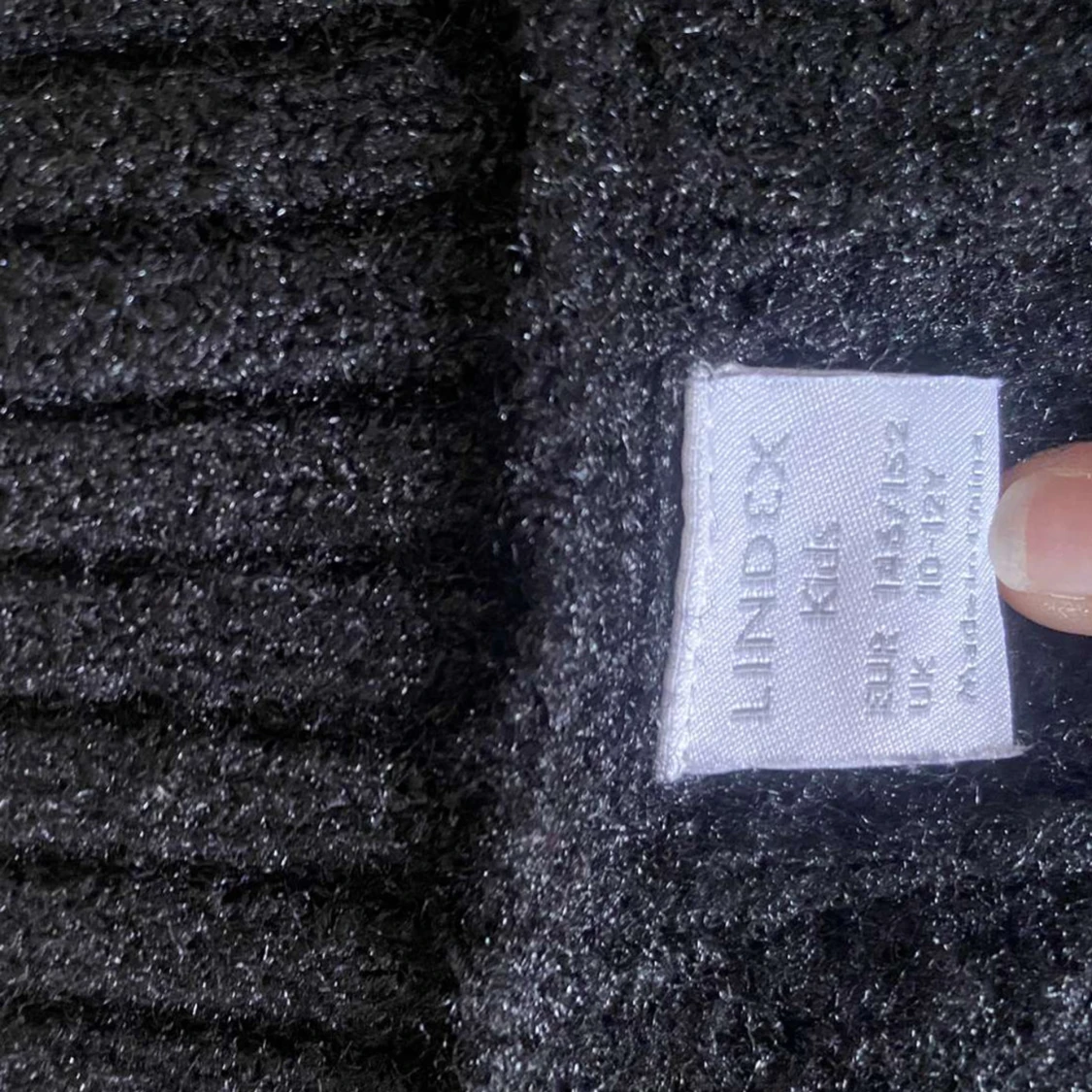 En svart Stickad armlös tröja - 91