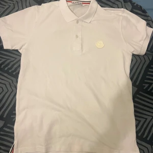 Moncler pike  - Storlek L 