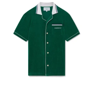 Grön kortärmad skjorta från Casablanca (intresse koll) - Snygg grön skjorta från Casablanca med korta ärmar och vit krage. Skjortan har knappar framtill och en bröstficka med broderad logga. Perfekt för en stilren look. Priset kan diskuteras