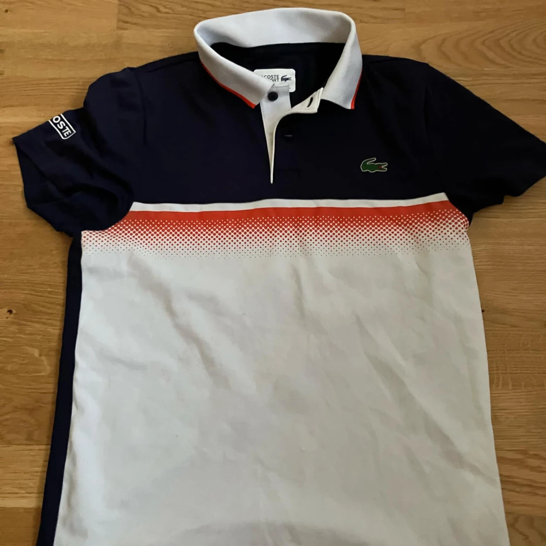 Svart och vit pikétröja från Lacoste - 1