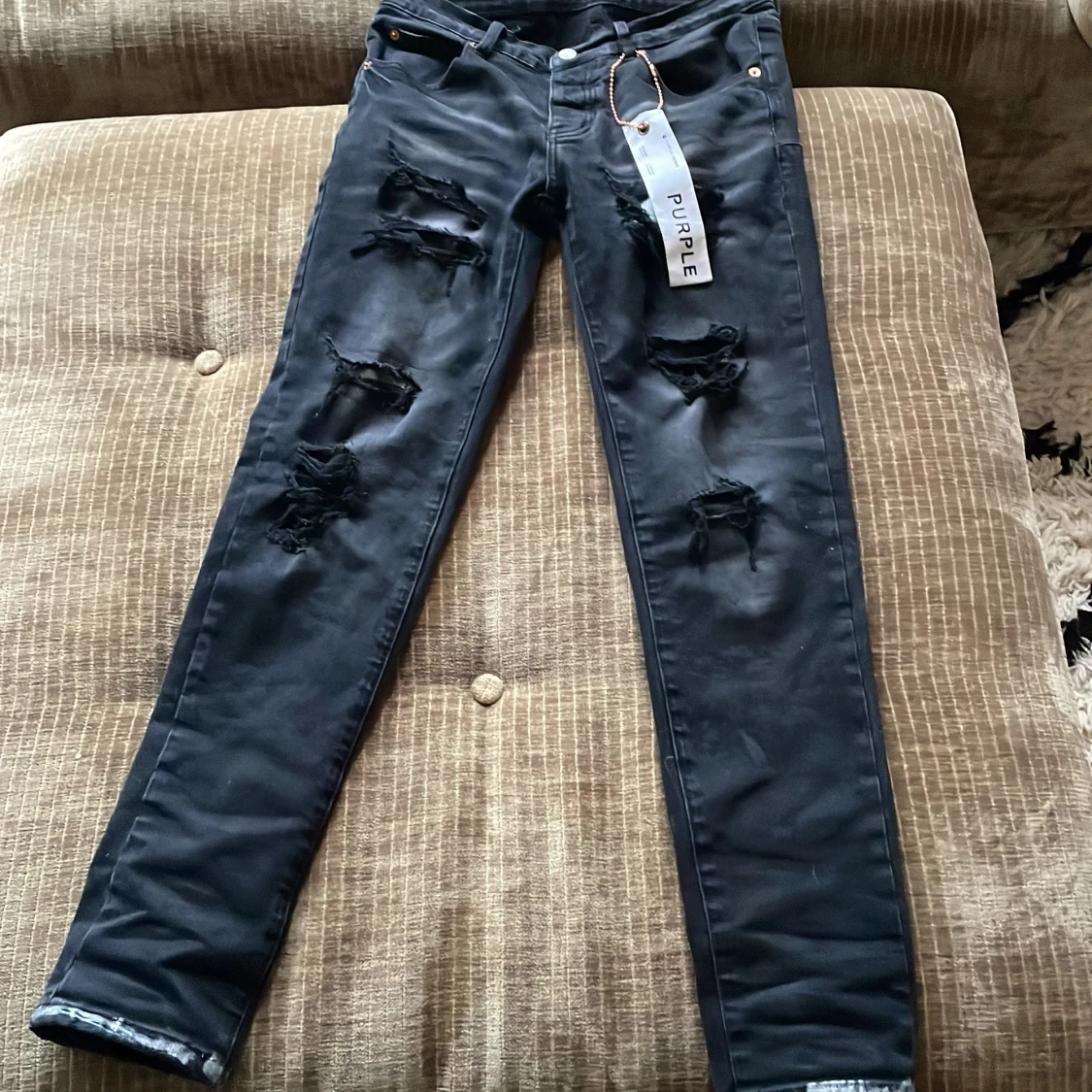 Svarta jeans med slitningar från Purple brand