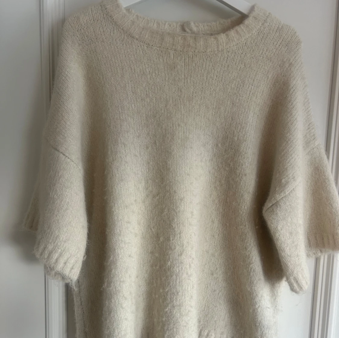 Kortärmad stickad tröja - 90