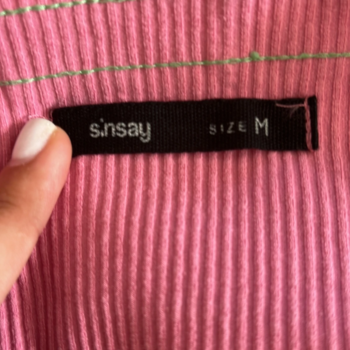 Rosa ribbad linnetopp från Sinsay - 91