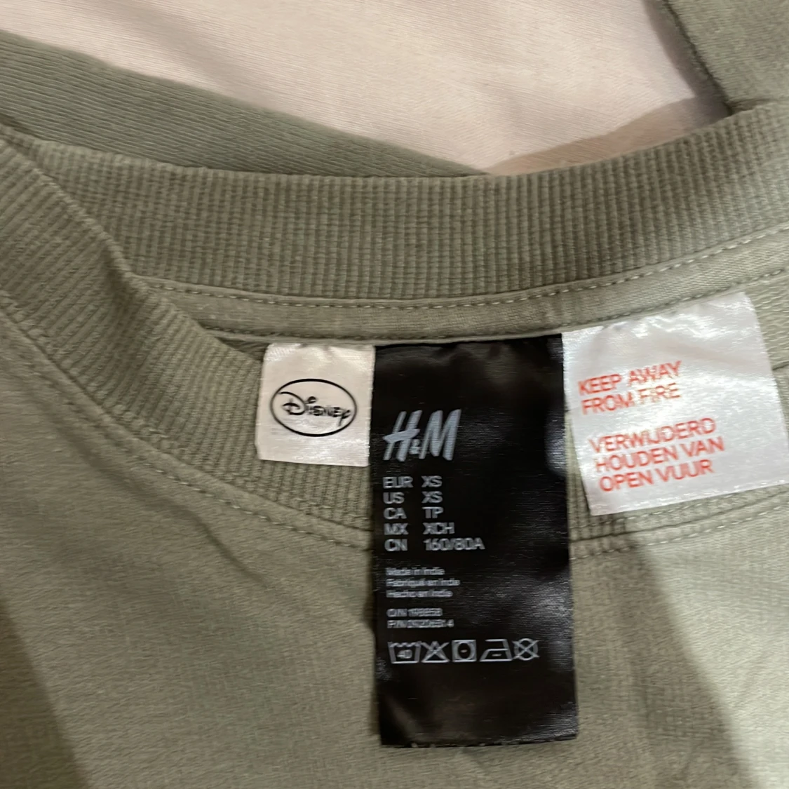 Grön tröja med Musse Pigg från H&M - 92