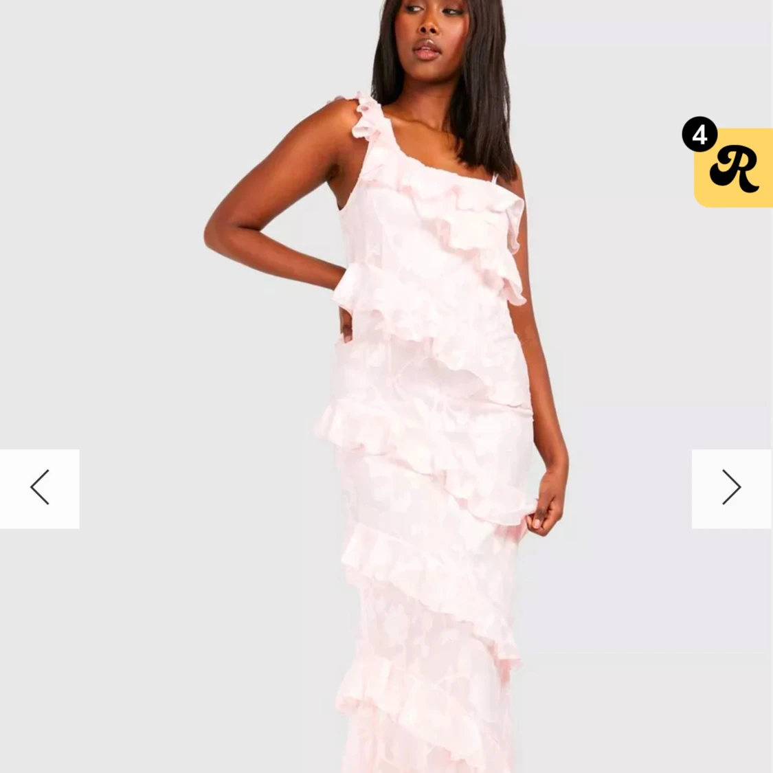 Ljusrosa volangklänning