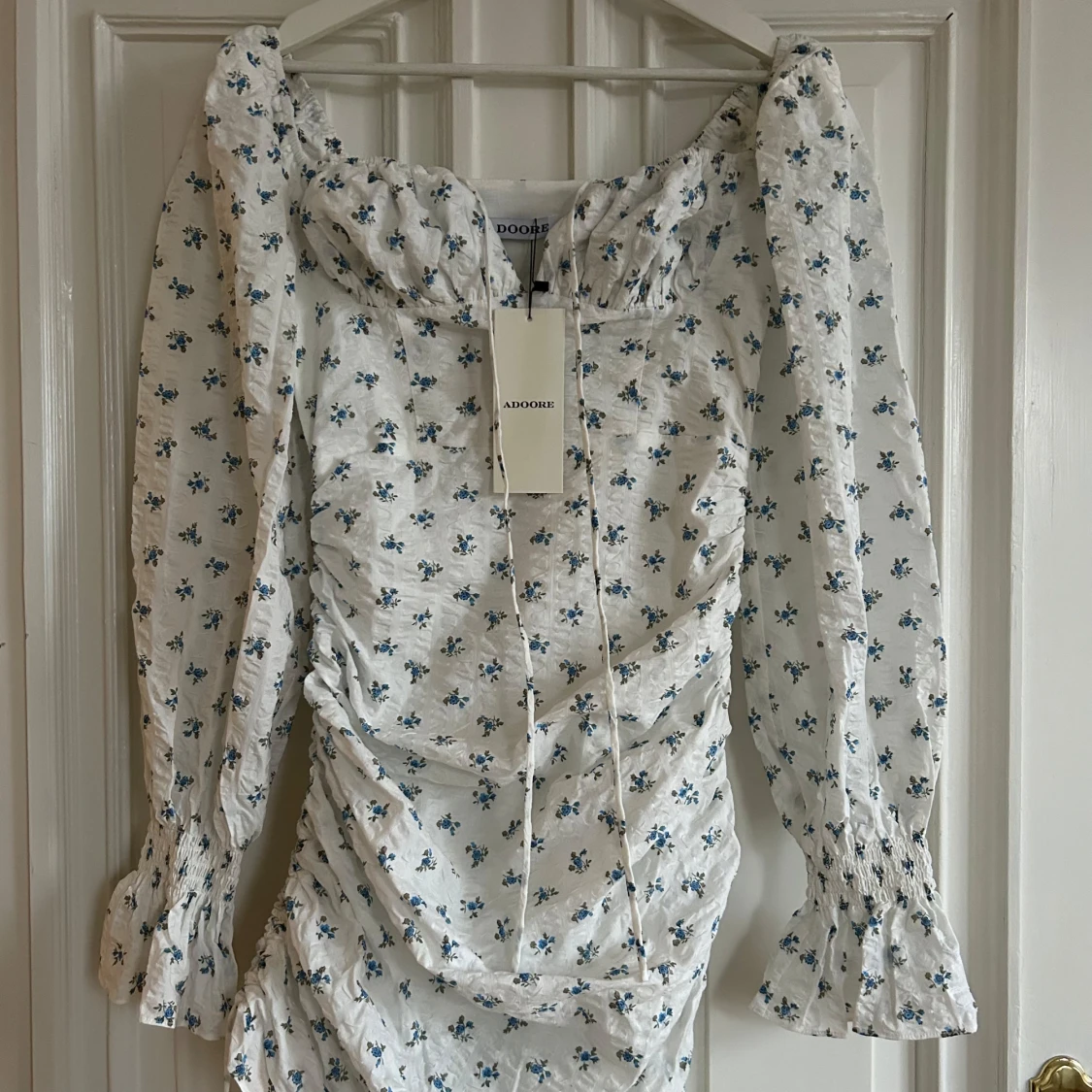 Blommig klänning från Adoore