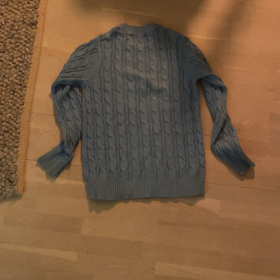 Blå stickad tröja från 157 - 2