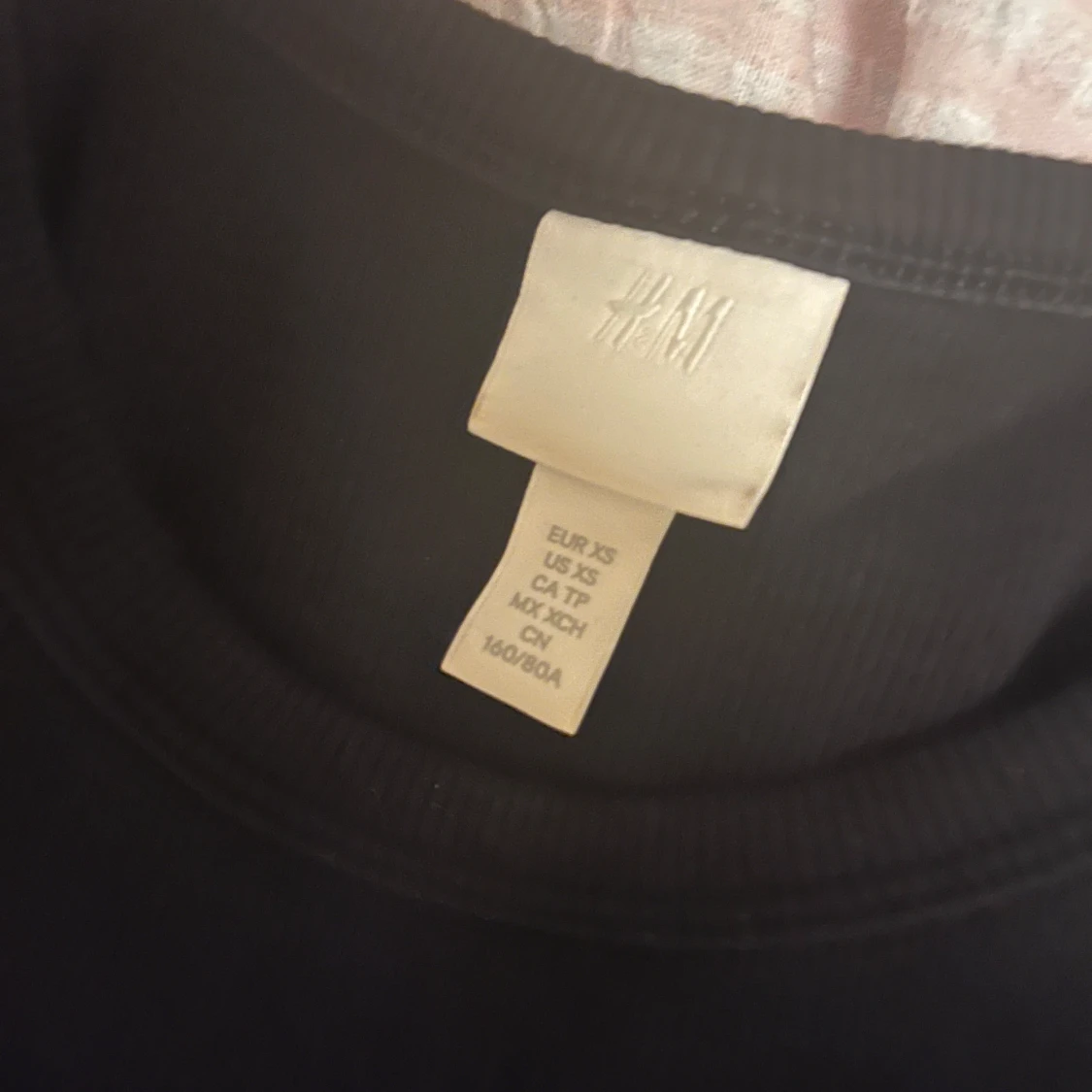 Svart ribbad linnetopp från H&M - 1