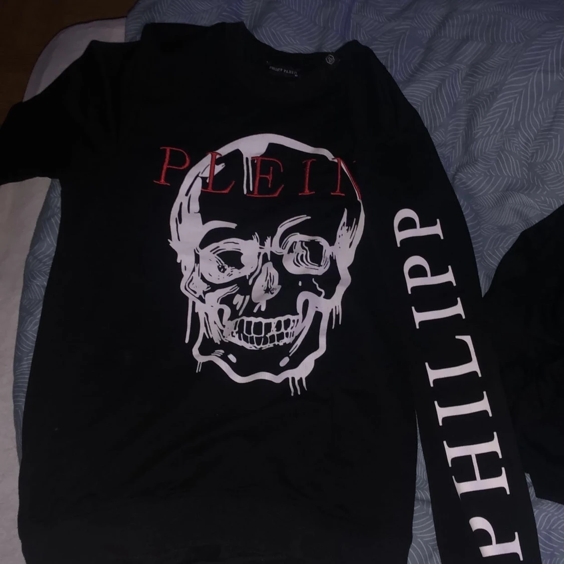 Svart långärmad tröja med dödskalletryck från Philipp Plein
