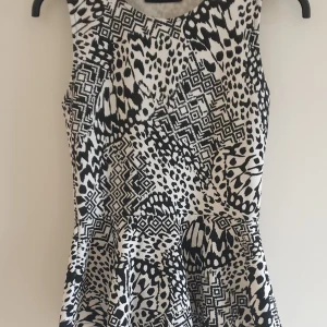 Peplum topp - Fint skick. 